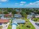 Nice aerial view of a blue single-story home with an attached garage in a quiet residential community at 6004 10Th Ave W, Bradenton, FL 34209
