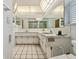 Spacious bathroom with large mirror, vanity, toilet and separate shower at 6004 10Th Ave W, Bradenton, FL 34209