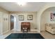 Cozy living area featuring a desk, art, and archway to another room at 6004 10Th Ave W, Bradenton, FL 34209