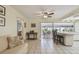 Open floor plan featuring a cozy living area connecting to the kitchen and lanai at 6004 10Th Ave W, Bradenton, FL 34209