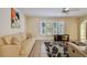 Comfortable living area with plenty of natural light and a decorative rug, perfect for relaxing at 6004 10Th Ave W, Bradenton, FL 34209