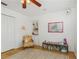 Bright bedroom with hardwood floors, a built-in bookshelf, and a fun, playful decor at 6015 S Elkins Ave, Tampa, FL 33611