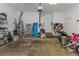 A spacious garage with storage solutions, including storage racks and shelves, for organization and convenience at 6015 S Elkins Ave, Tampa, FL 33611