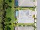 Bird's eye view showing landscaping and roof at 6317 Rivo Lakes Blvd, Sarasota, FL 34241