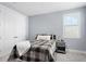 Comfortable bedroom with a modern decor, a queen bed and great lighting at 6317 Rivo Lakes Blvd, Sarasota, FL 34241