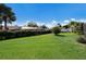 Expansive backyard offering a lush lawn and mature landscaping at 7301 12Th W Ave, Bradenton, FL 34209
