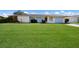Charming single-story home with a well-manicured lawn and inviting curb appeal in a peaceful neighborhood at 7301 12Th W Ave, Bradenton, FL 34209