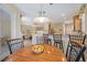 Cozy breakfast nook area with pendant lighting and views of the living area at 7439 Sea Island Ln, University Park, FL 34201