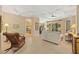 Spacious living room featuring tile floors, neutral walls, comfortable seating and an open floorplan at 7439 Sea Island Ln, University Park, FL 34201