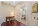 Office space showing hardwood floors, a desk, and an en-suite bathroom at 7439 Sea Island Ln, University Park, FL 34201