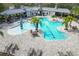 Aerial view of a community pool featuring a playful splash zone and plenty of seating at 7439 Sea Island Ln, University Park, FL 34201