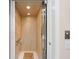 A residential elevator featuring wood paneling, chrome trim and handrail, and recessed lighting at 7470 Botanica Pkwy # 201B22, Sarasota, FL 34238