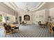 Community meeting room featuring elegant decor, comfortable seating, and ample space for gatherings at 7470 Botanica Pkwy # 201B22, Sarasota, FL 34238