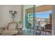 Inviting balcony featuring comfortable seating with a view of the surrounding neighborhood at 750 N Tamiami Trl # 304, Sarasota, FL 34236
