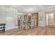 Elegant dining room with a glass table, stylish chairs, and a mirrored wall at 750 N Tamiami Trl # 304, Sarasota, FL 34236