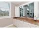 Kitchenette features granite countertops, white cabinets and is open to a beautiful lobby area at 750 N Tamiami Trl # 304, Sarasota, FL 34236