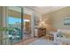 Comfortable living room with a view of the balcony at 750 N Tamiami Trl # 304, Sarasota, FL 34236
