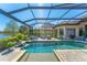 Wonderful pool and patio with lush landscaping and screened in lanai. Great for entertaining at 7643 Haddington Cv, Bradenton, FL 34202