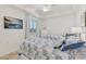 Bright bedroom with two twin beds featuring sea-themed bedding and decor at 850 Tidewater Shores Loop # 202, Bradenton, FL 34208