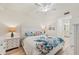 Comfortable bedroom with a large bed and charming decor, with an ensuite bathroom at 850 Tidewater Shores Loop # 202, Bradenton, FL 34208