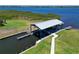 Aerial view of the boat lift facility that allows water access to the bay at 850 Tidewater Shores Loop # 202, Bradenton, FL 34208