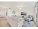 Bright living room with comfortable seating and lots of natural light at 850 Tidewater Shores Loop # 202, Bradenton, FL 34208