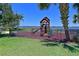 Community playground with waterfront view, providing recreational space for children at 850 Tidewater Shores Loop # 202, Bradenton, FL 34208