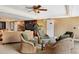 Inviting common area with comfortable seating, a television, and lovely decor at 8710 Midnight Pass Rd # 202, Sarasota, FL 34242