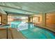 Indoor-outdoor pool features inviting and clear water, with plenty of lounging space at 8710 Midnight Pass Rd # 202, Sarasota, FL 34242