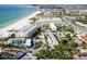 Stunning aerial view of the coastline, community, and beach at 1020 Sun N Sea Dr # 104B, Sarasota, FL 34242