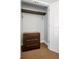 Organized closet with dresser, providing ample storage space and convenience at 1020 Sun N Sea Dr # 104B, Sarasota, FL 34242