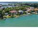 Stunning waterfront homes with private docks, lush landscaping, and serene water views at 1020 Sun N Sea Dr # 104B, Sarasota, FL 34242