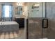Modern bathroom featuring a soaking tub, vanity, and glass-enclosed shower stall at 11702 Tetrafin Dr, Riverview, FL 33579