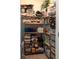 Organized storage closet with shelves filled with containers, bottles and other supplies at 11702 Tetrafin Dr, Riverview, FL 33579