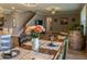 Dining room view with rustic wood table, setting and decor, connecting seamlessly to living spaces at 11702 Tetrafin Dr, Riverview, FL 33579