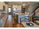 This kitchen features a large island, stainless appliances and modern cabinets at 11702 Tetrafin Dr, Riverview, FL 33579