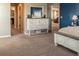 Spacious main bedroom featuring a vintage dresser and ample closet space at 11702 Tetrafin Dr, Riverview, FL 33579