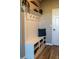 Mudroom with a bench and storage for shoes, plus a hall tree with hooks and a shelf at 11702 Tetrafin Dr, Riverview, FL 33579