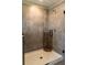 Modern bathroom with a glass-enclosed shower with nice ceramic tiling at 11702 Tetrafin Dr, Riverview, FL 33579