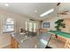 Wet bar with granite countertop overlooks the spacious game room at 13615 4Th Ne Ave, Bradenton, FL 34212