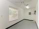 Clean and simple garage interior with a window for natural light at 13615 4Th Ne Ave, Bradenton, FL 34212