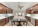 This expansive kitchen features wood cabinets, granite countertops, stainless appliances, and center island at 13615 4Th Ne Ave, Bradenton, FL 34212