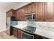 Modern kitchen features stainless steel appliances and stylish backsplash at 13615 4Th Ne Ave, Bradenton, FL 34212