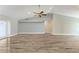Large living room with wood flooring and contemporary design elements at 13615 4Th Ne Ave, Bradenton, FL 34212