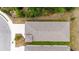 Aerial view of the home's roof, driveway and landscaping at 1800 Little Bird Ct, Sarasota, FL 34235