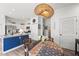 Stylish kitchen flows into the dining area, featuring modern appliances and lighting at 1800 Little Bird Ct, Sarasota, FL 34235