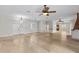 Open-concept living room with beautiful hardwood floors and neutral walls at 1828 Mova St, Sarasota, FL 34231