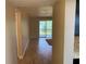 Inviting living room with tile floors and sliding glass doors to a patio area at 205 46Th Avenue W Ter # 425, Bradenton, FL 34207