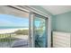 Relaxing balcony view of the beach and ocean with outdoor seating, accessible from the interior room at 2301 Gulf Of Mexico Dr # 26N, Longboat Key, FL 34228