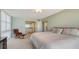 Inviting bedroom with ocean view, large bed, and an en-suite bathroom at 2301 Gulf Of Mexico Dr # 26N, Longboat Key, FL 34228